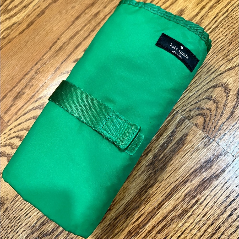 Green Kate Spade travel changing pad